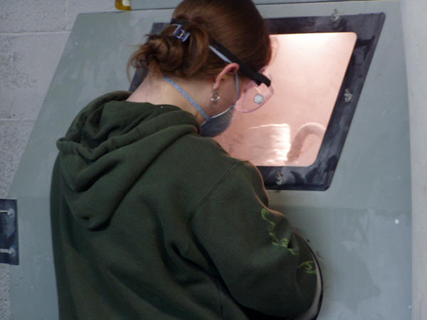 Sculpture Student Sandblasting